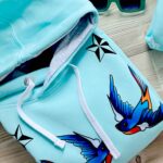 bluza mietowa damska na lato z jaskółakmi